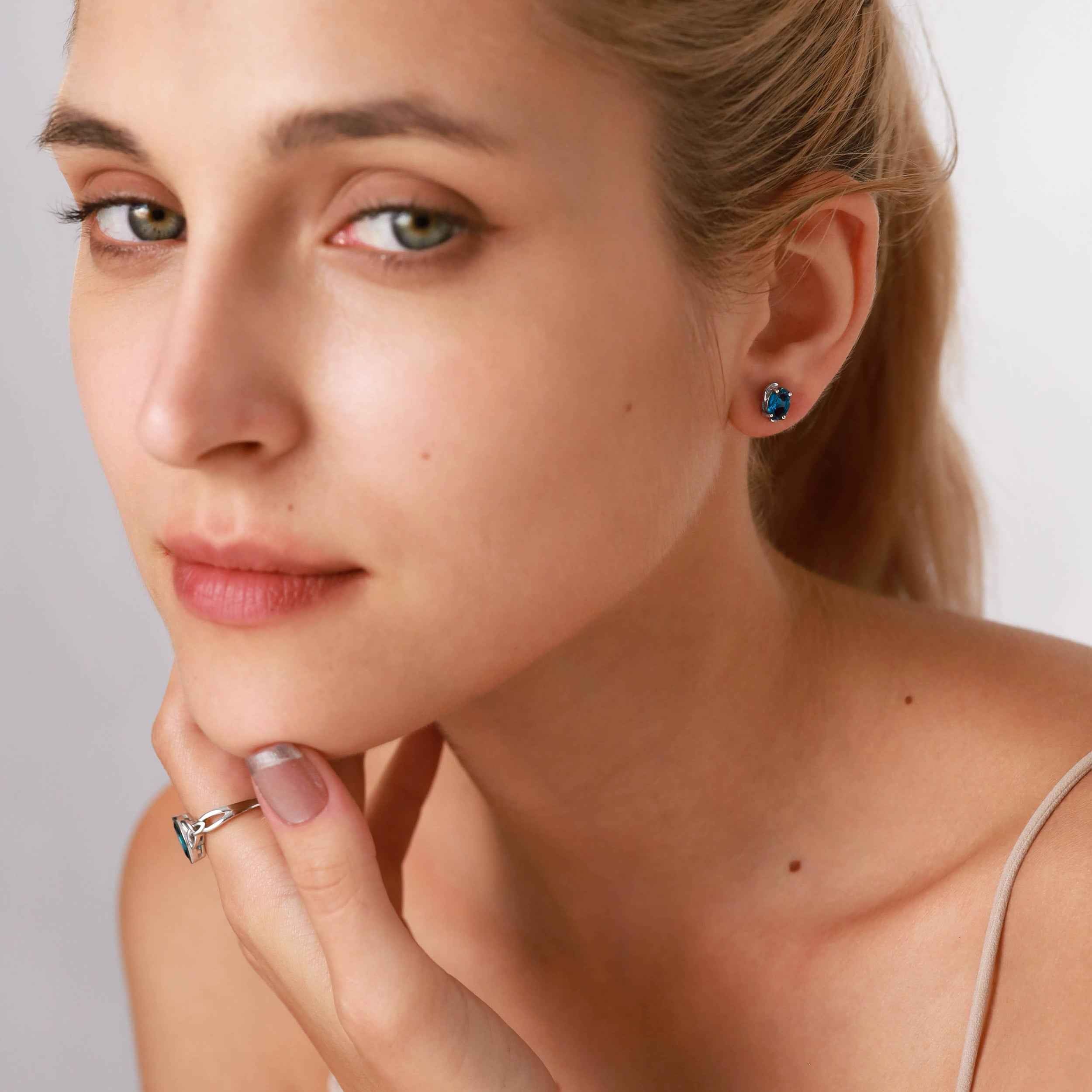 1.26ct. 7X5mm Genuine Oval Shape Aquamarine White Gold Plated 925 Sterling Silver Stud Earrings