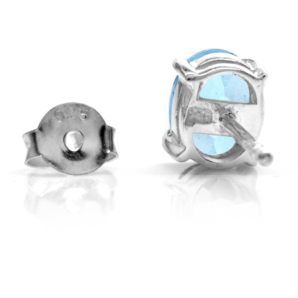 1.7ct. Genuine 7X5mm Oval Shape Swiss Blue Topaz White Gold Plated 925 Sterling Silver Stud Earrings - Silvershake-store